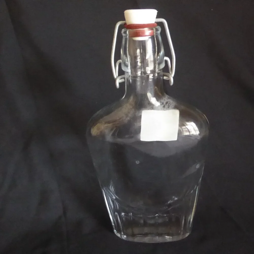 NEW 12.5” - 9.5” CRATE BARREL ITALY CLEAR GLASS AIR TIGHT LOCKING TOP 3 BOTTLES